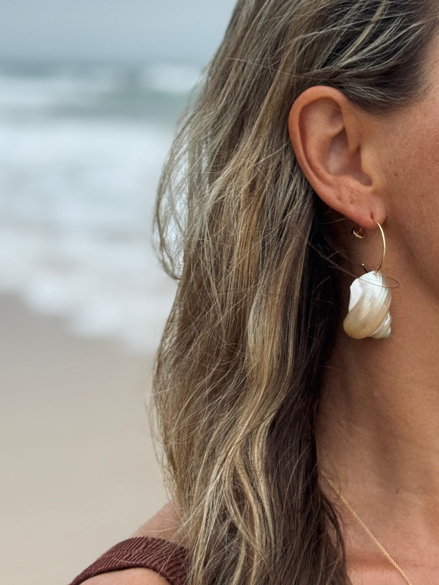 Pearlescent spiral shell hoop earrings