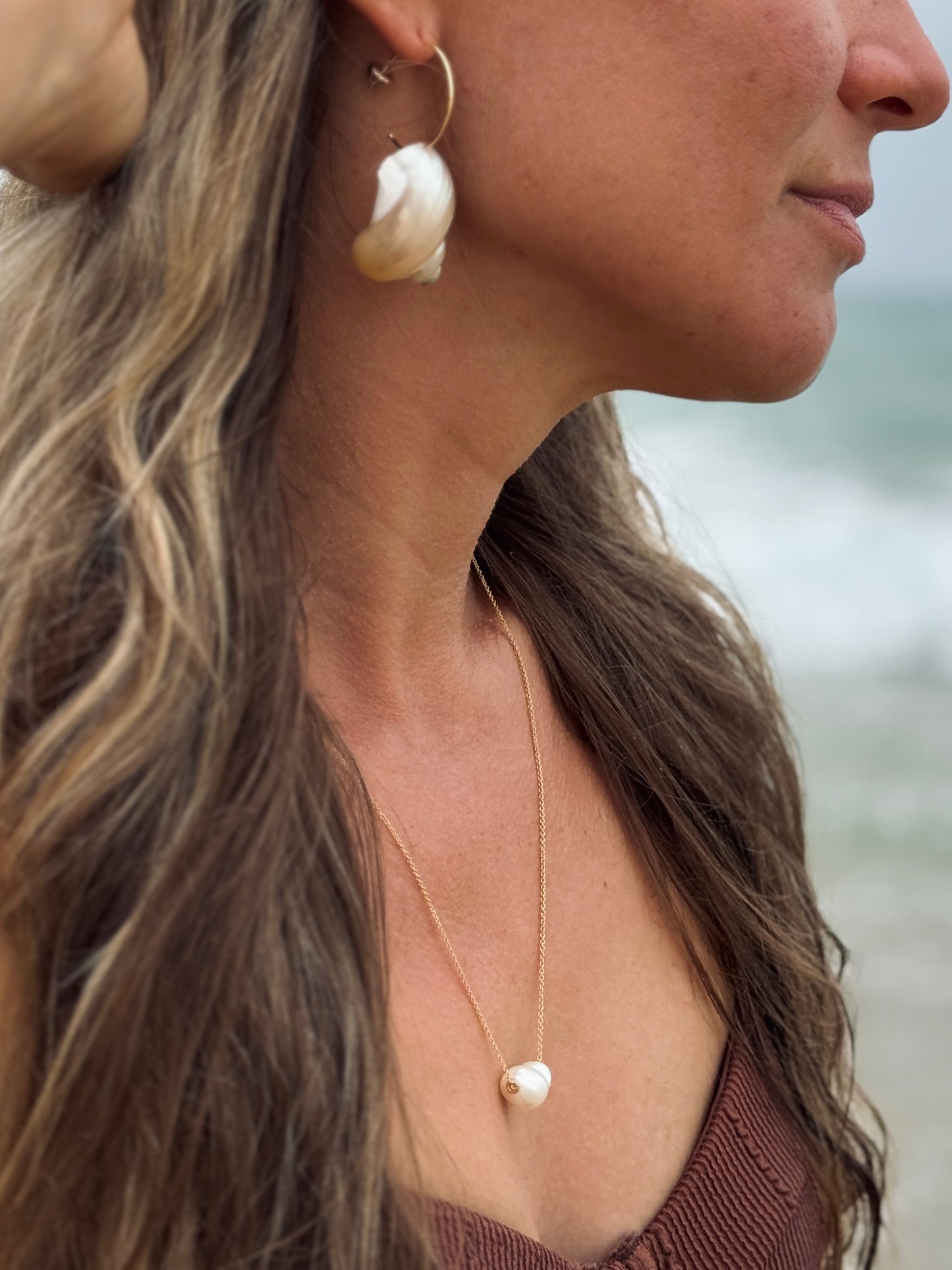 Pearlescent spiral shell hoop earrings