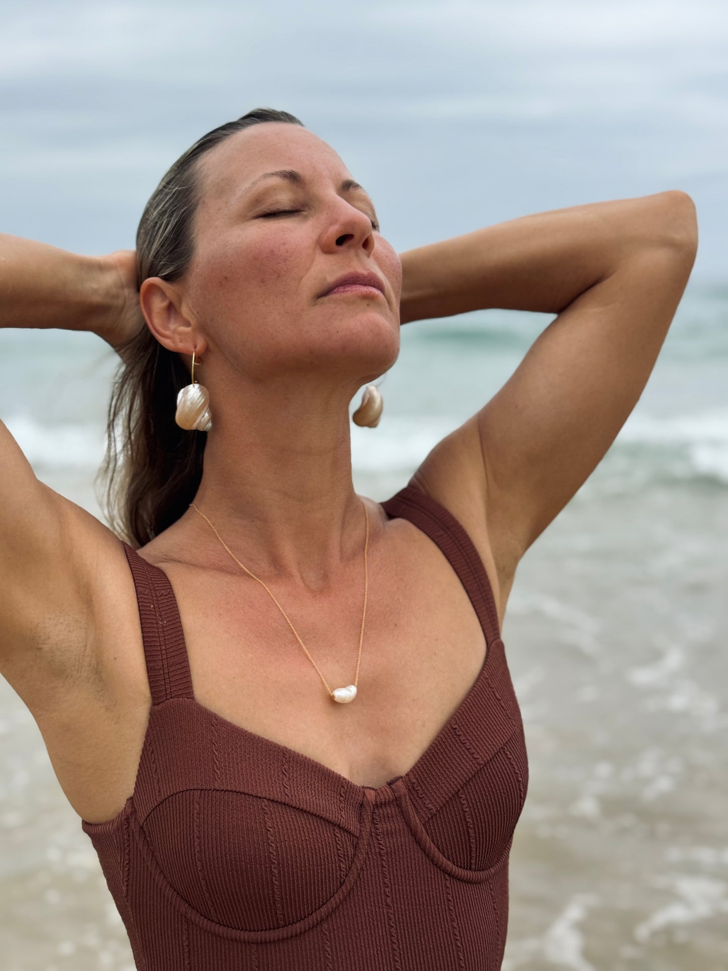 Pearlescent spiral shell hoop earrings